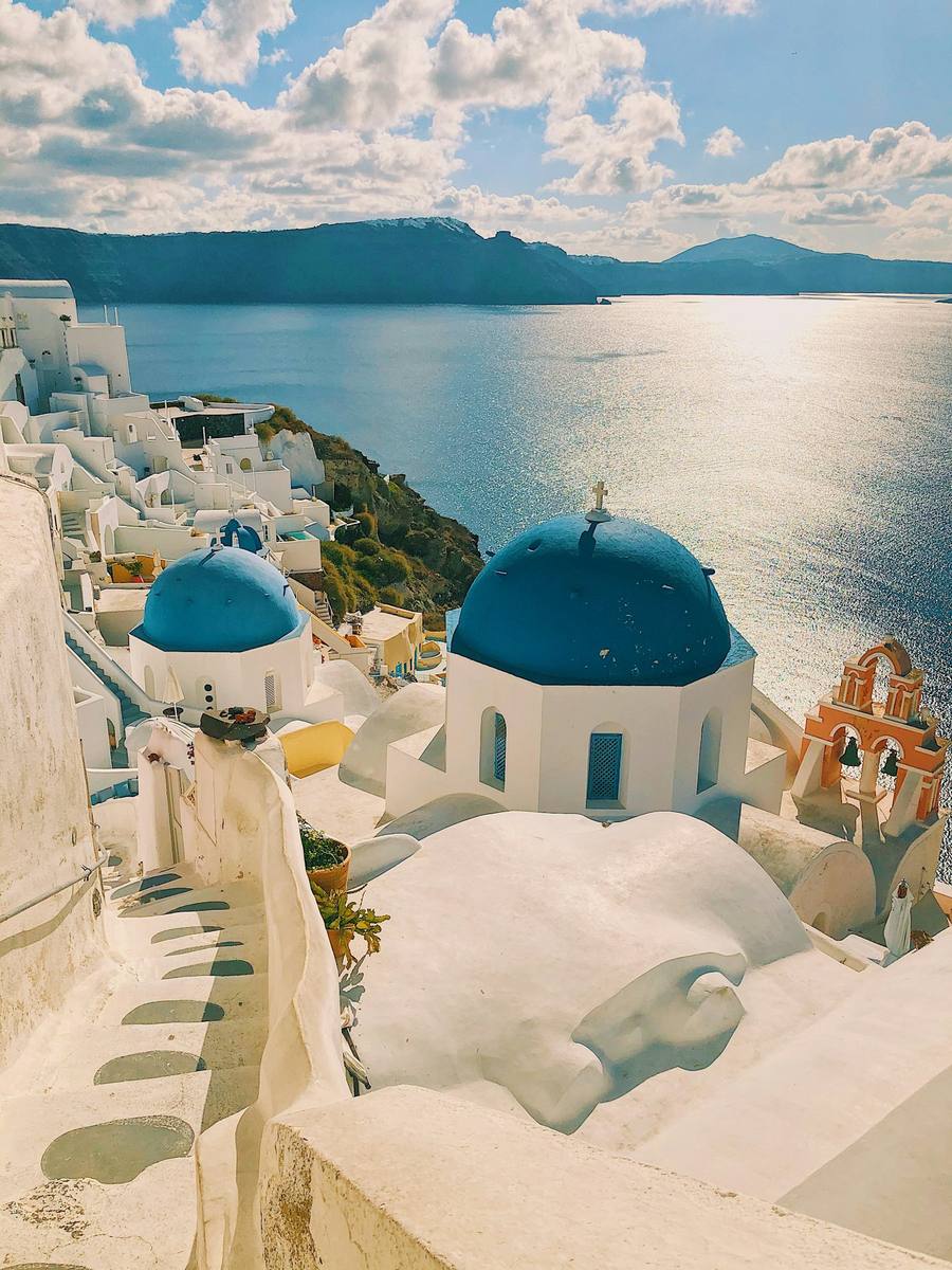 Blue domed churches above the caldera in Oia, Santorini